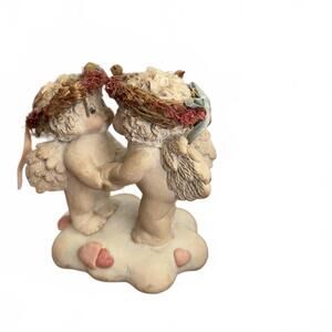 Precious Moments angels figurines